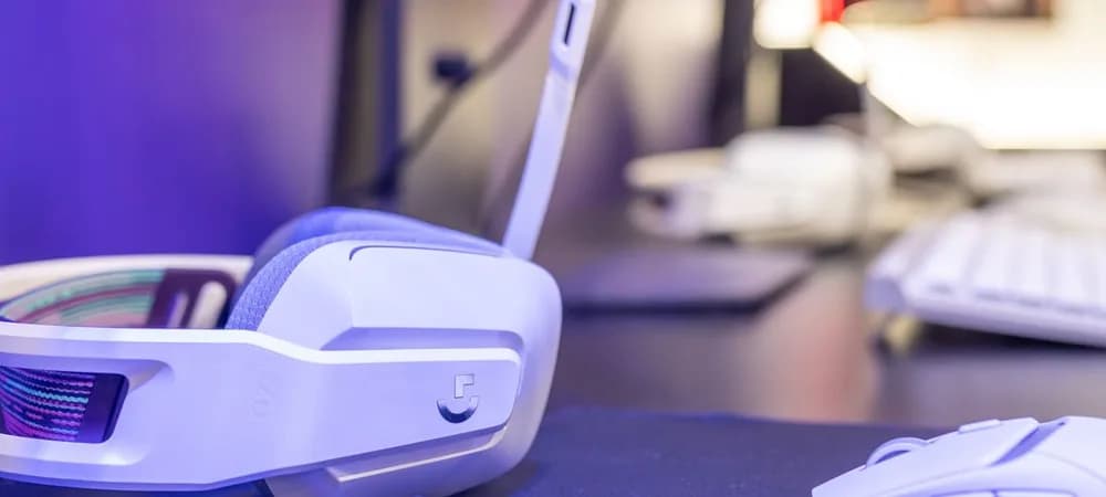 Gaming headset and keyboard with purple lighting